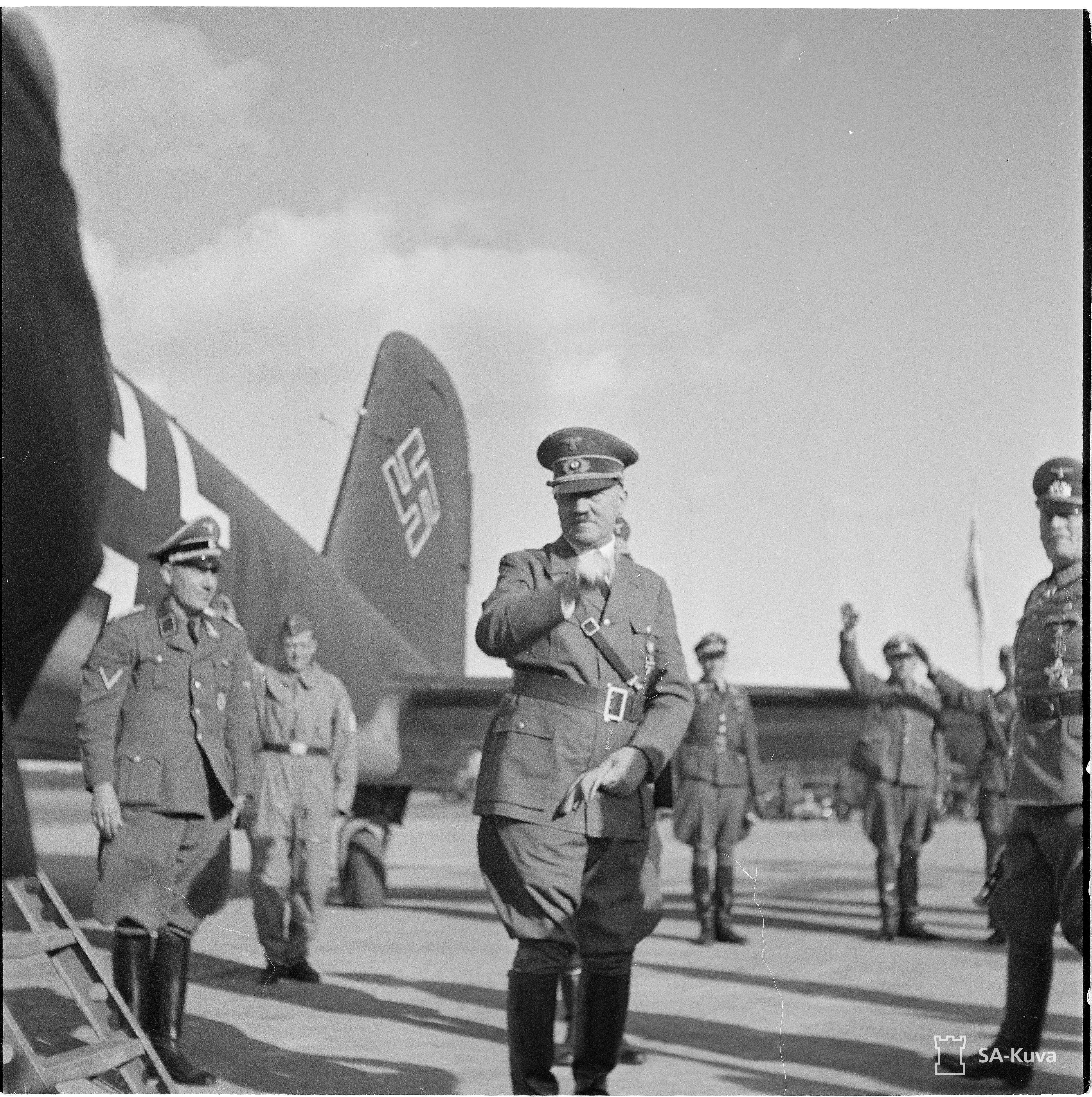 Adolf Hitler at his arrival in Finland in front of his Focke-Wulf Fw 200 Condor